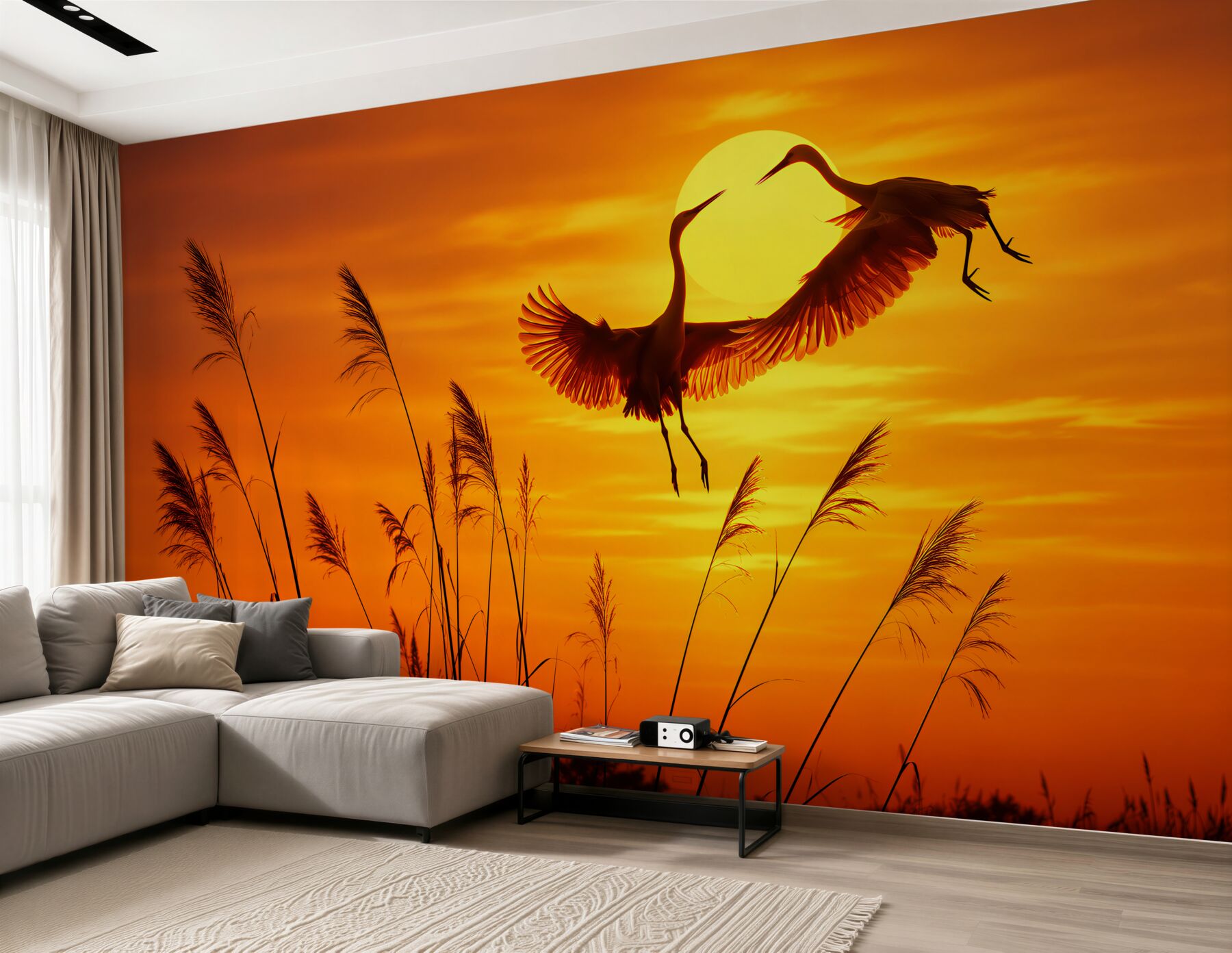 Papier peint grues observant le coucher de soleil