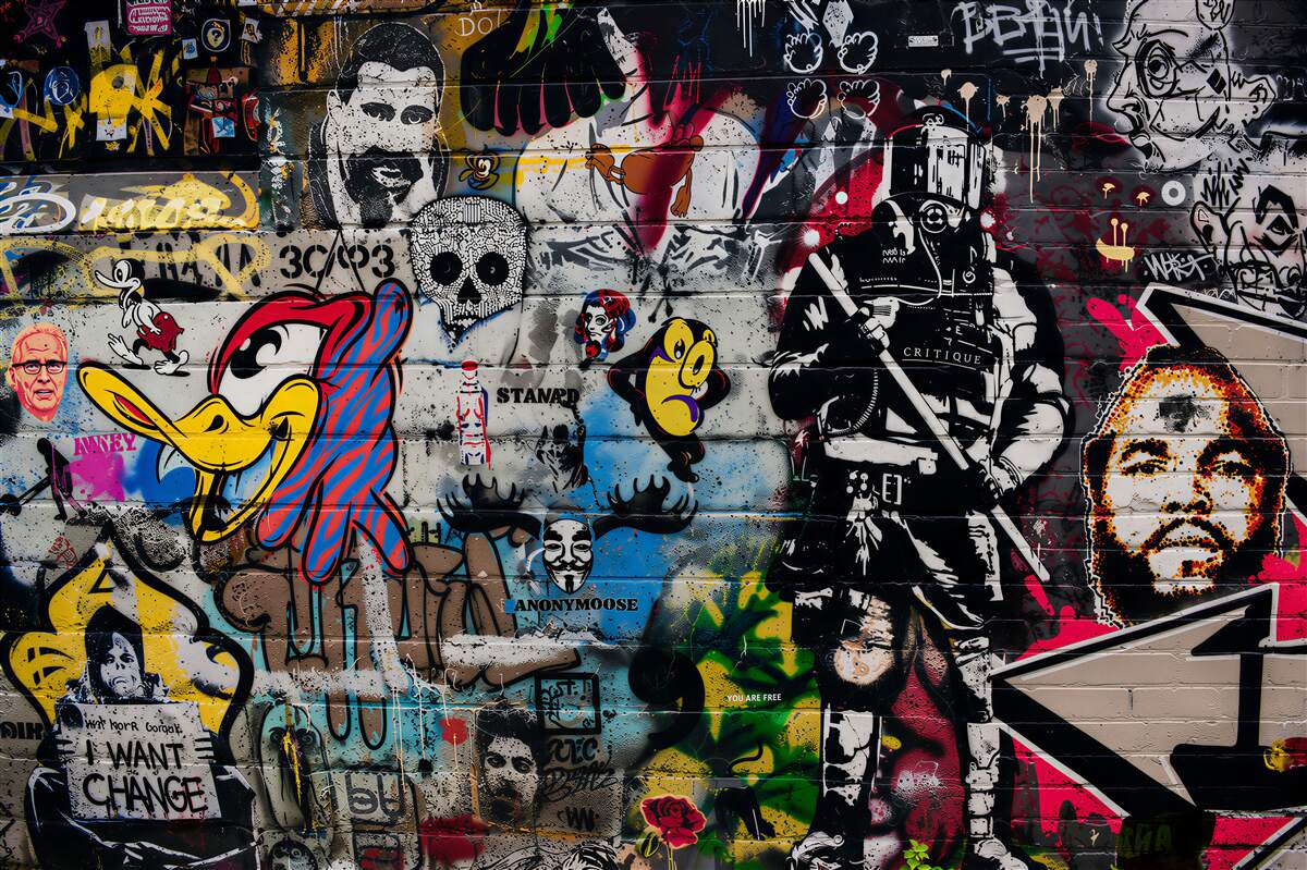 Papier peint Mur recouvert de graffiti