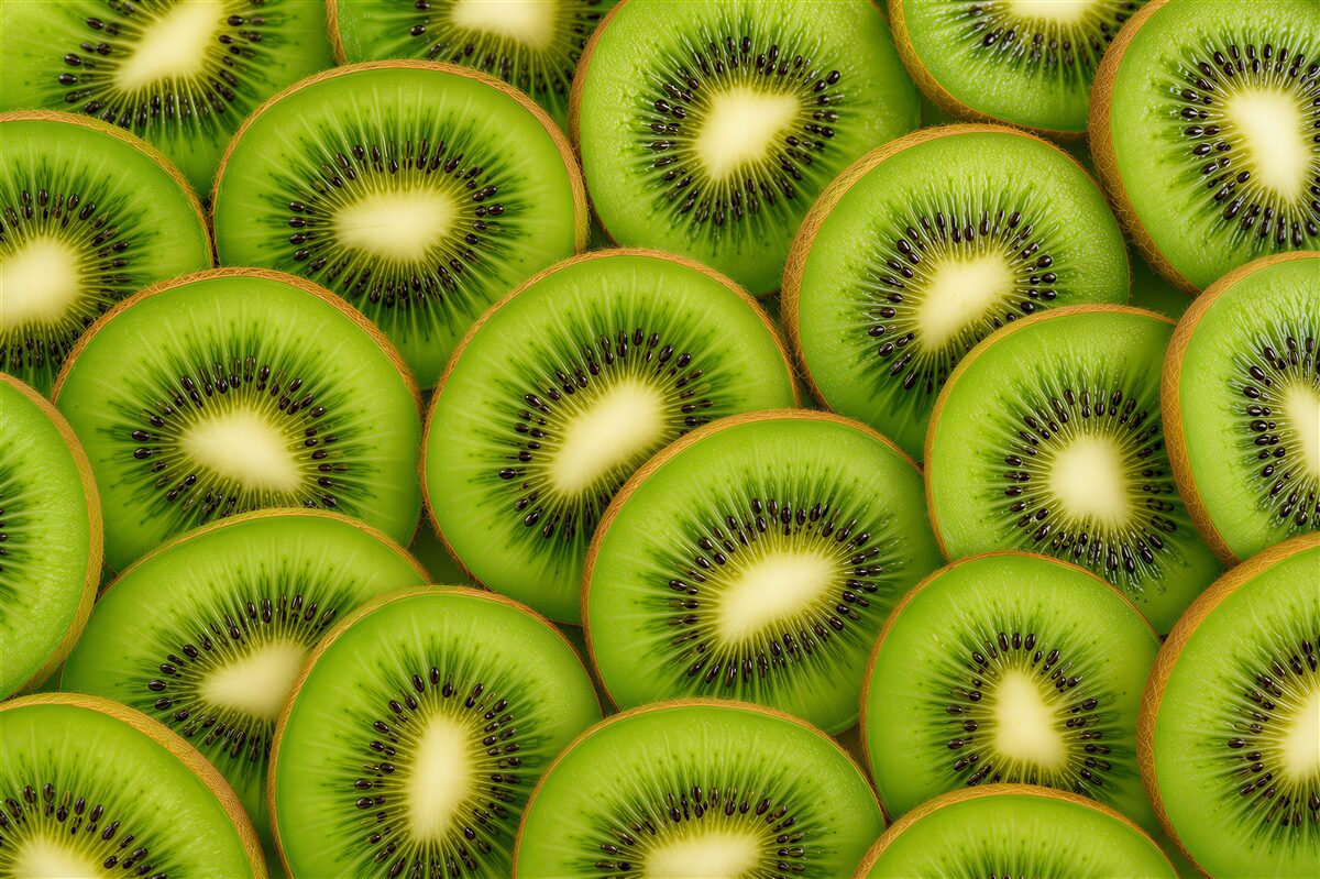 Papier peint kiwis juteux et feuilles vertes pour la cuisine