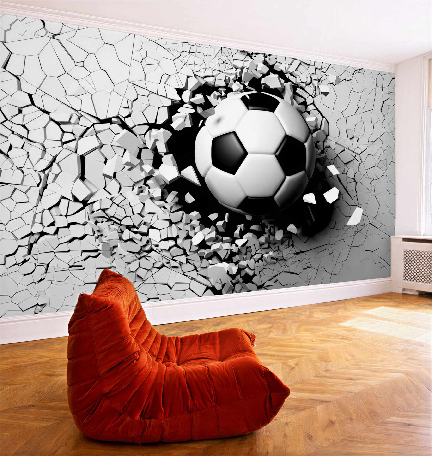 Papier peint Un ballon de football brise le mur